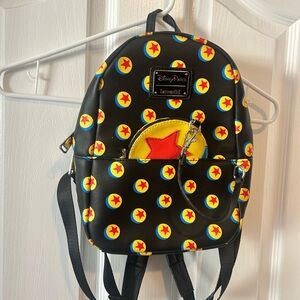 Loungefly Black Mini Bag with Red and Yellow Star Pattern
